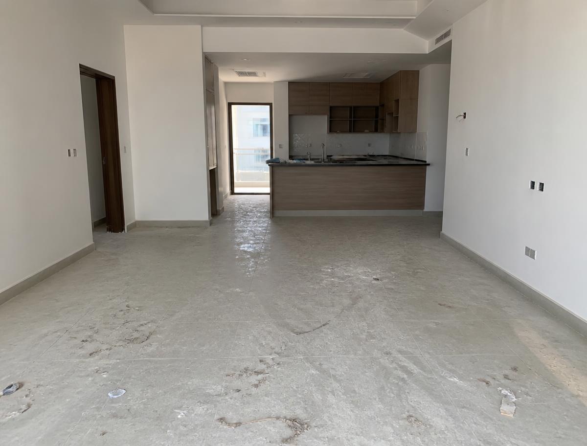 Apartment covered in construction dust before cleaning